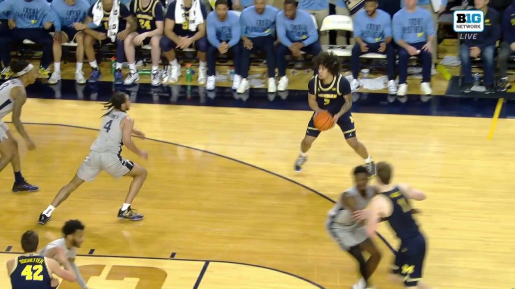 Tre Donaldson DRAINS GO-AHEAD STEPBACK 3-pointer, membantu Michigan mengalahkan Penn State