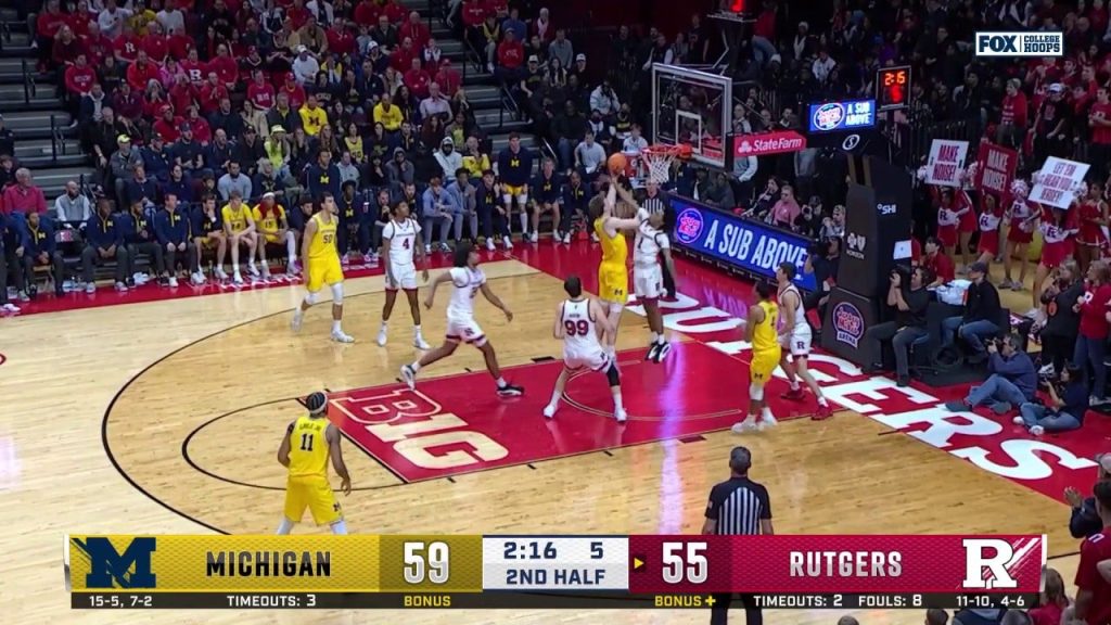 Danny Wolf mencetak gol dari hidangan yang bagus dari Nimari Burnett untuk mengamankan kemenangan 66-63 Michigan atas Rutgers