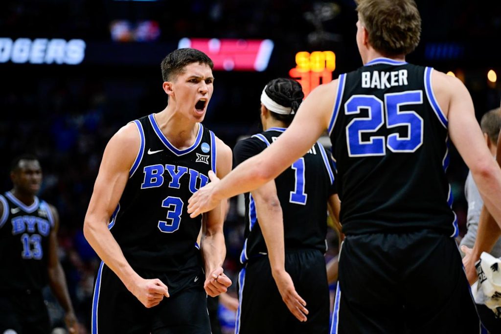 March Madness: BYU menangkis reli Wisconsin yang menakjubkan, Hands Big Ten Kehilangan Pertama Setelah 10-0 Mulai di Turnamen NCAA